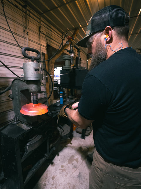 Seth fabricating a skillet in a blacksmith shop