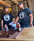 Carnivore Snap-Back Hat and Bearded Butcher Blend Seasoning Hat on Scott and Seth with Ribs, Seasonings, and Sauce