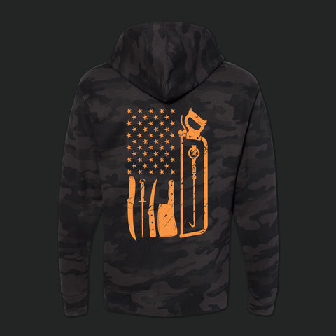 Back of Bearded Butcher Pullover hoodie in black camo with neon orange tools of trade