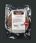 Packaged beef hickory BBQ premium brat burger with label on a reflective surface