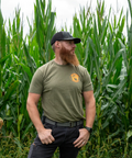 Bearded Butcher wearing Branded hunter green  t-shirt