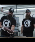 Picture of The Bearded Butchers with Seth holding summer sausage.