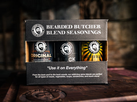 6 Pack of Bearded Butcher Blend Seasoning Shakers on Cutting Board