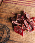 Bearded Butchers Original Beef Jerky on Cutting Board