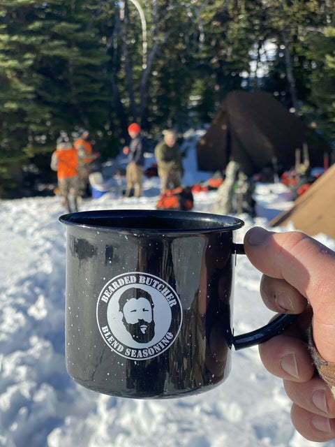 Bearded Butcher Blend Coffee in Branded Mug at Snowy Campsite 