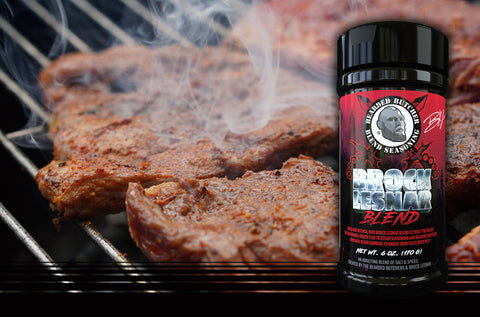 Bearded Butcher Brock Lesnar Blend Seasoning with Meat on Grill