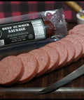 Beef summer sausage sliced on cutting board and in package