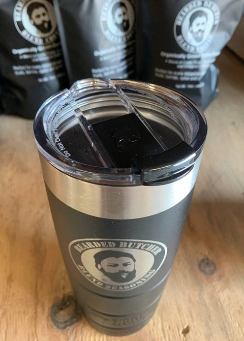 Bearded Butcher 22oz Vacuum Insulated Tumbler on Table with Coffee