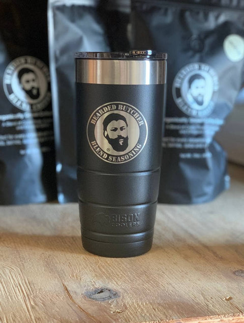 Bearded Butcher 22oz Vacuum Insulated Tumbler on Table with Coffee Bags